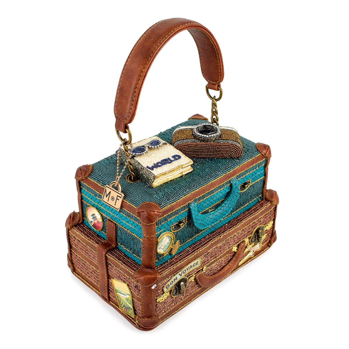 Beaded handbag in the shape of two stacked suitcases with a handle on a white background