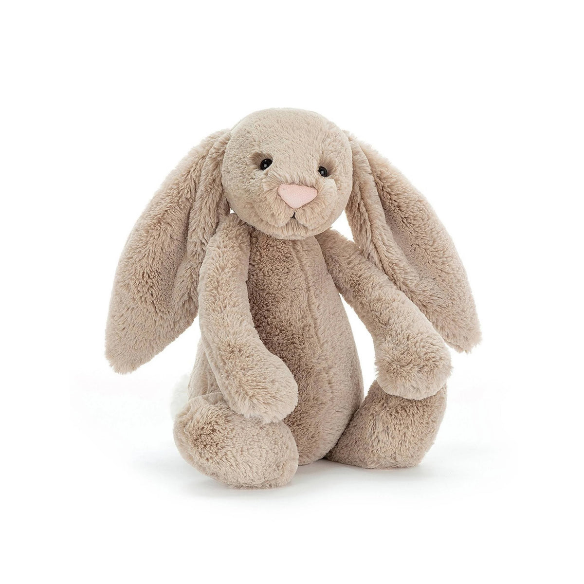 A plush stuffed Jellycat Bashful Bunny toy in a light taupe-beige color, sitting upright against a seamless white background.
