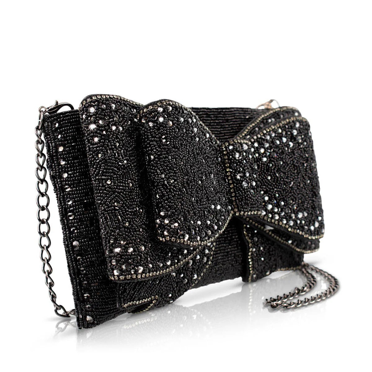 Black beaded clutch bag with a bow and chain strap on a white background