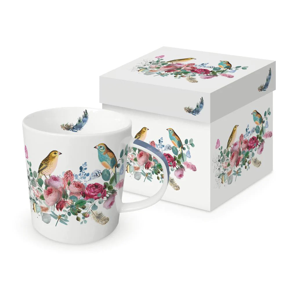 Start you day with a chorus of admiration with this 'Bird Conversation' bone China mug. The outside of the mug features a colorful design of birds and flowers, with a single feather decorating the interior. Made from fine bone China and presented in a matching gift box. 13.5 oz. Dishwasher/Microwave safe.