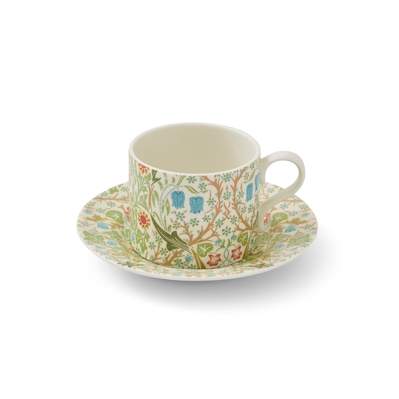 A teacup and saucer set with a floral pattern, featuring the William Morris print 'Blackthorn' with predominantly green leaves and colorful flowers.