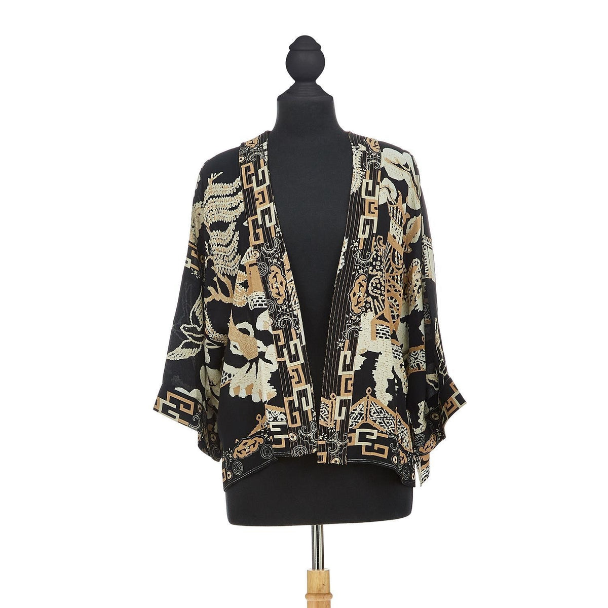 A short kimono style jacket with a large Chinese style willow pattern printed on a black base. One size.