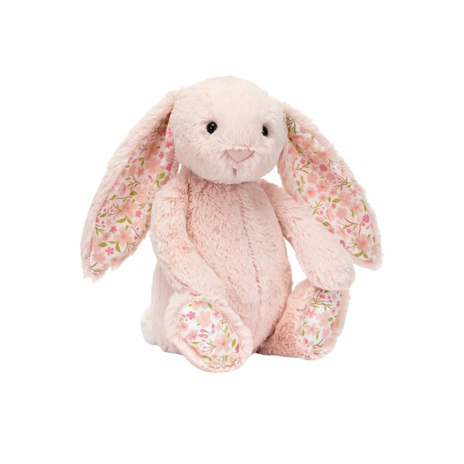 A plush stuffed Jellycat Blossom Bunny in pale pink with long floppy ears and pink floral lining, sitting on a plain white background.