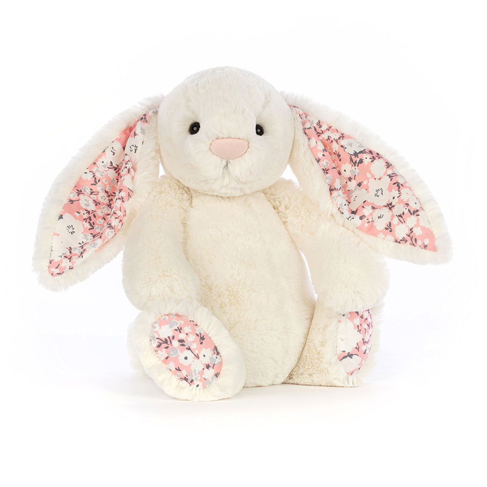 Cherry Blossom Bunny is dressed up for spring with adorable ditsy-print ears and paws! This creamy bunny has a powder-pink nose, cuddly tummy, and silky bobtail. A gorgeous gift for nature lovers. Dimensions: 12.2in x 4.7in x 3.5in Sitting Height: 9in. Suitable from birth.