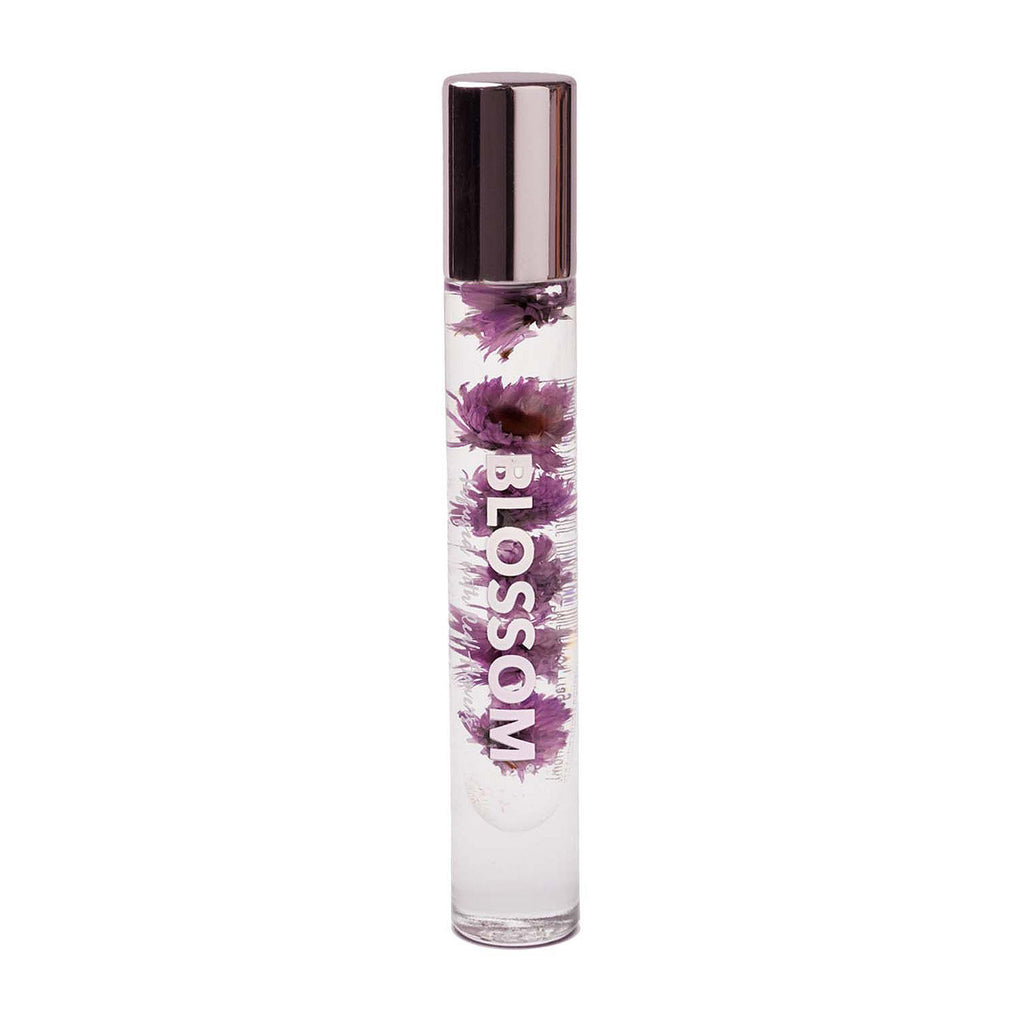 Sophisticated and layered, this pretty perfume oil is made with natural ingredients and essential oils for a long-lasting, fresh and wearable scent. Fragrance Notes: Top: Floral Heart: Citrus Base: Woodsy Elements Contains real flowers Travel Size 0.20 fl. oz. Made in California, USA.