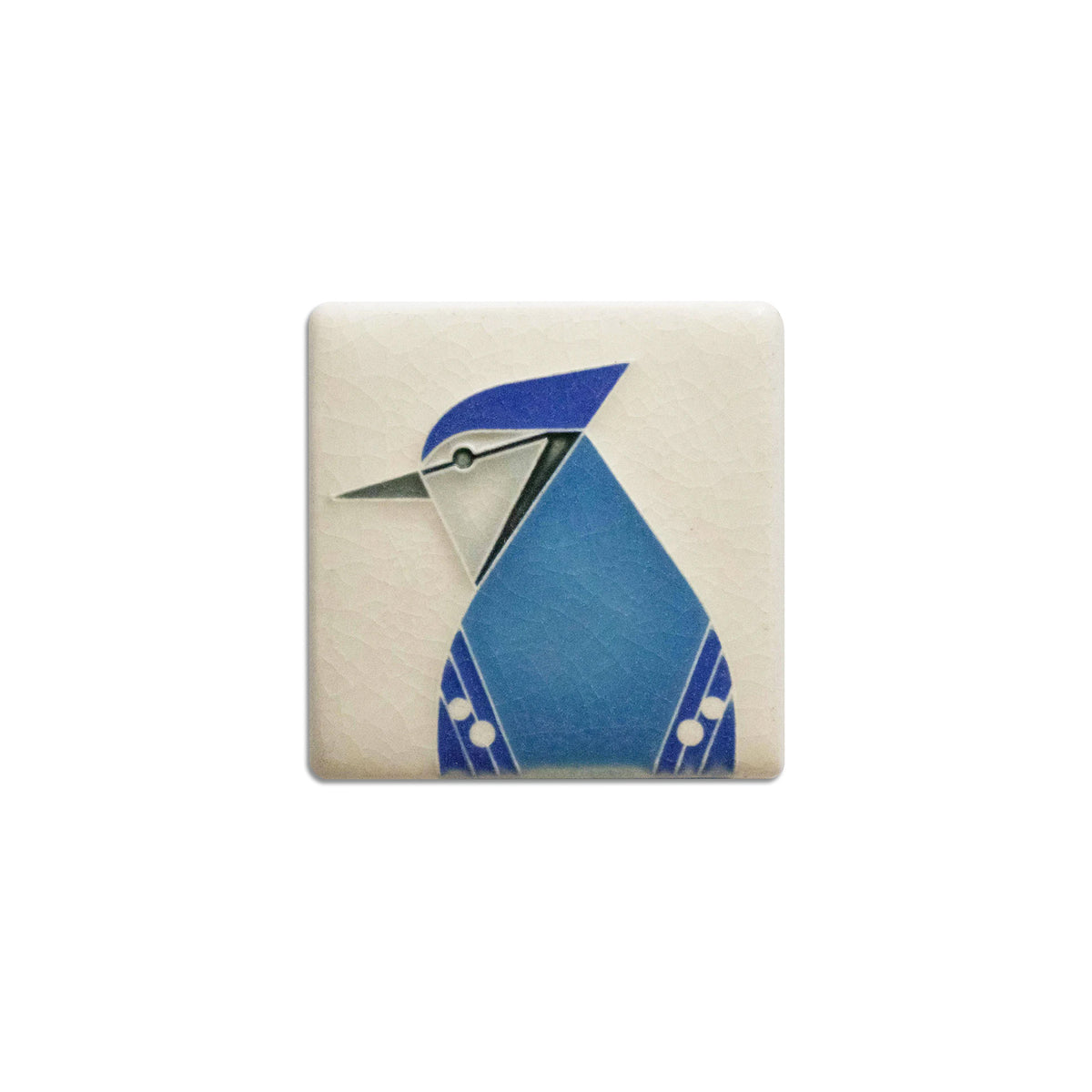 Square ceramic tile with a blue bird design on a beige background