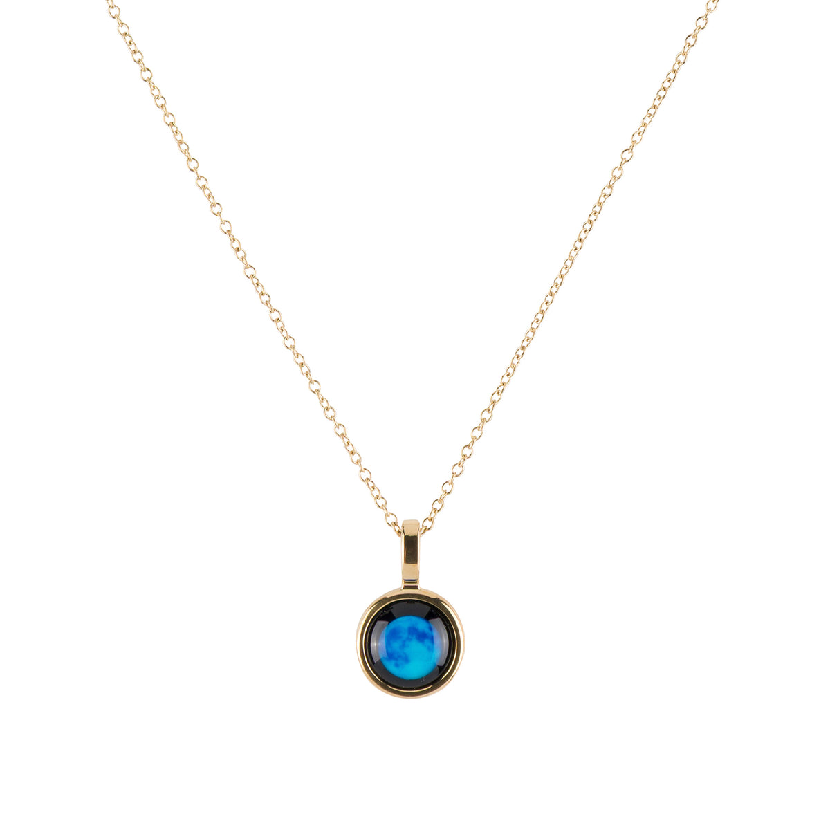 A delicate gold chain necklace with a round bezel-set pendant featuring a vibrant blue iridescent moon stone, shown against a solid white background.