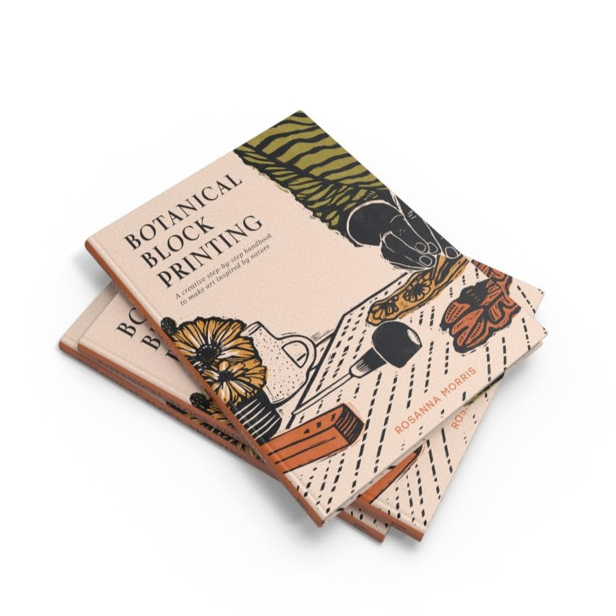 Stack of books titled &#39;Botanical Block Printing&#39; on a white background