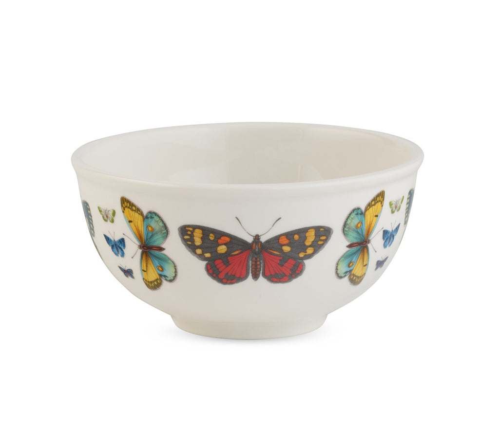 This pretty 6" bowl is adorned with beautiful butterflies, and will find endless uses for serving side dishes, condiments, breakfast cereal or for an individual bowl of ice cream. Made from off-white porcelain. Material: Porcelain Dimensions: 6" x 3.5". Dishwasher, microwave and freezer safe.