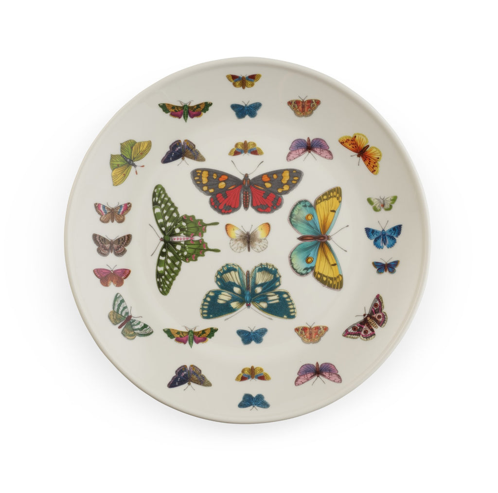 This porcelain plate is perfect for salads, desserts, or use to serve canapes and sweet treats. Decorated with botanical style illustrations of butterflies, this plate is durable enough to use every day, but decorative enough for special occasions. Dimensions: 8.5" diameter Dishwasher, microwave and freezer safe.