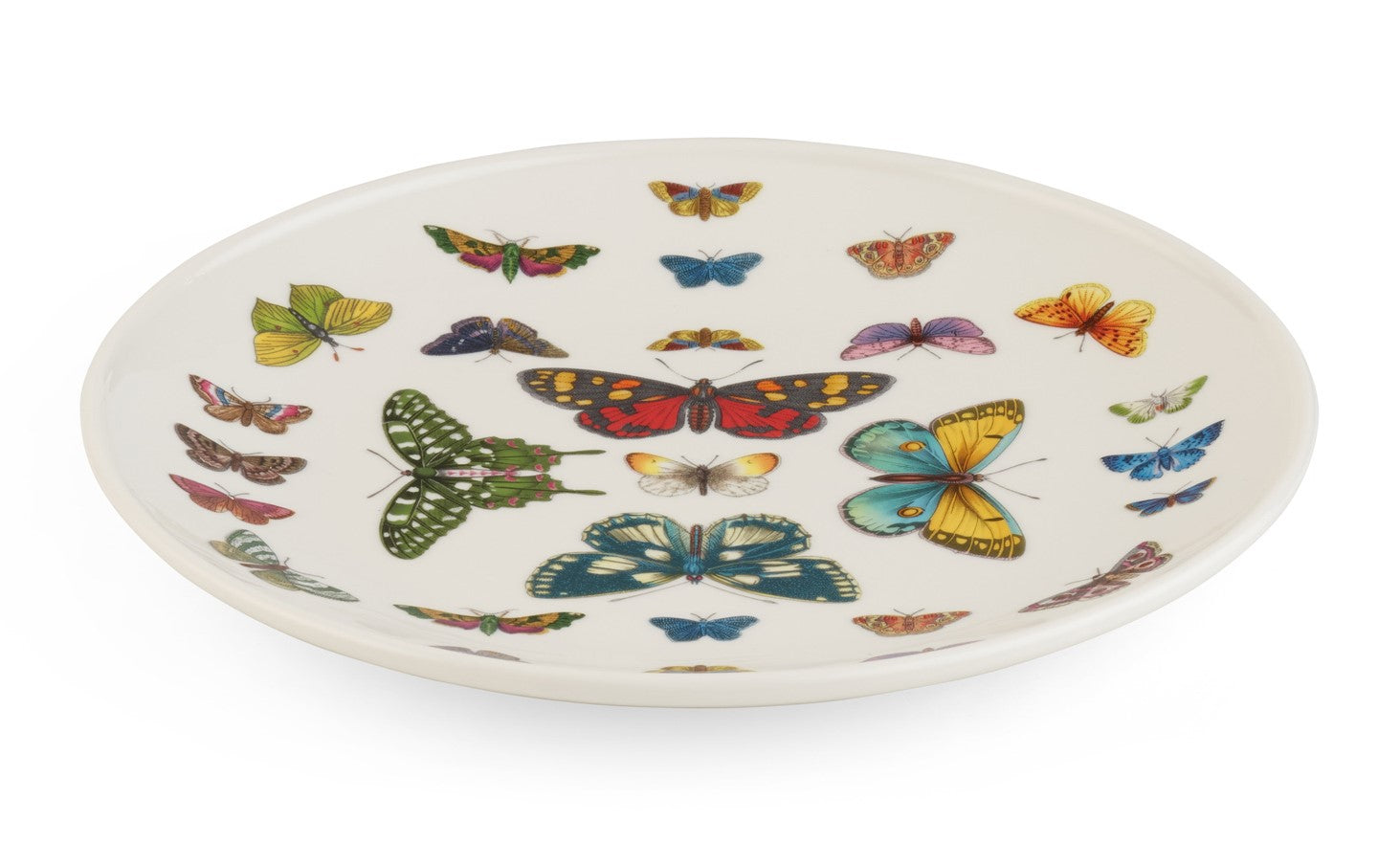 This porcelain plate is perfect for salads, desserts, or use to serve canapes and sweet treats. Decorated with botanical style illustrations of butterflies, this plate is durable enough to use every day, but decorative enough for special occasions. Dimensions: 8.5" diameter Dishwasher, microwave and freezer safe.
