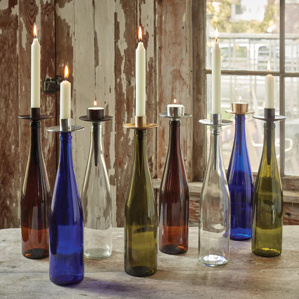 Turn your favorite wine bottles into a distinctive candelabra with this ingenious Bottelabra candle holder. Designed to hold tapers, they are easy to use. Just push into almost any empty wine bottle, and you have an instant, chic candle holder! 3.25in x 5.5in.