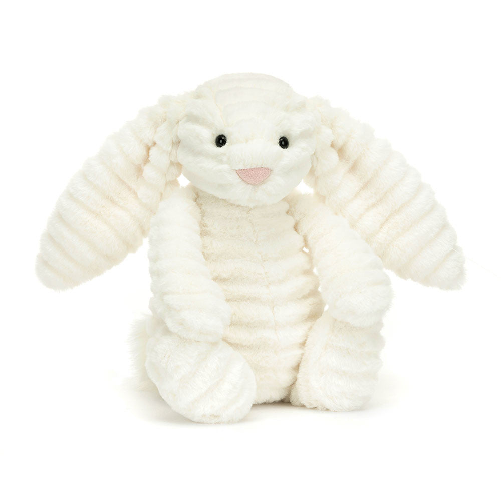 Is Bashful Luxe Bunny Nimbus a lop-eared bunny, or a fluffy cloudlet in disguise? Heavenly-soft in double-cream rumples, with glossy eyes, a silky tail and a dainty suedette nose, Nimbus is such a wonder. Size: 12.2" x 4.7" x 3.5" Sitting Height: 9". Not recommended for children under 12 months due to fiber shedding.