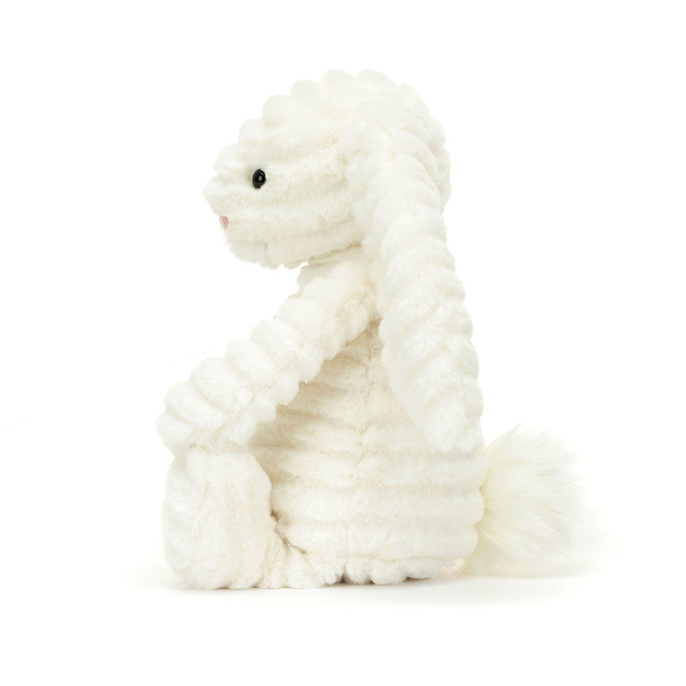 Is Bashful Luxe Bunny Nimbus a lop-eared bunny, or a fluffy cloudlet in disguise? Heavenly-soft in double-cream rumples, with glossy eyes, a silky tail and a dainty suedette nose, Nimbus is such a wonder. Size: 12.2" x 4.7" x 3.5" Sitting Height: 9". Not recommended for children under 12 months due to fiber shedding.
