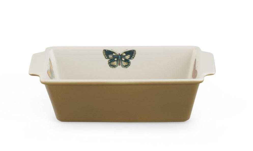 on the interior and rich olive glaze on the exterior. Culinary creations can go straight from the freezer to the oven to table with ease. Made of durable porcelain and is dishwasher safe. Dimensions: 11" x 5.5" x 3.3". 46 fl.oz