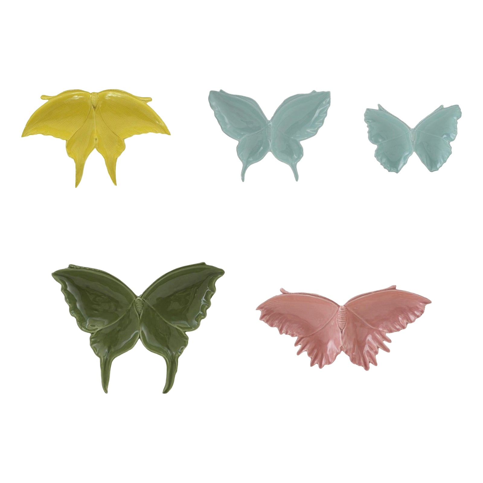 Set of five butterfly-shaped ceramic plates in different pastel colors on a white background