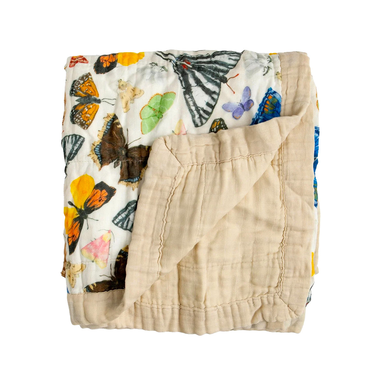 Reversible baby blanket with a colorful butterfly print on one side and a solid beige color on the reverse, on a white background
