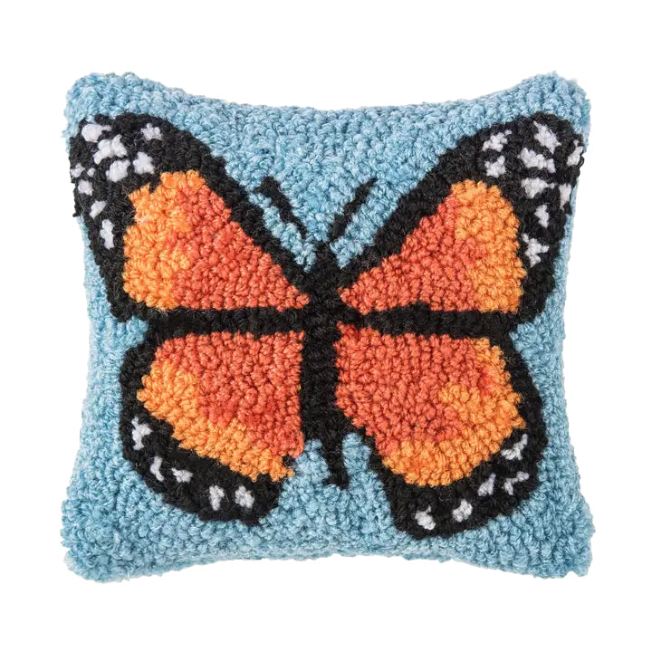 The majestic Monarch butterfly is a welcome sight in any garden. Celebrate this beautiful bug with this fittingly colorful decorative mini pillow. The front is made from hardwearing hooked acrylic wool which creates a wonderfully three-dimensional effect. The reverse is a soft cotton canvas. Dimensions: 8"x 8".