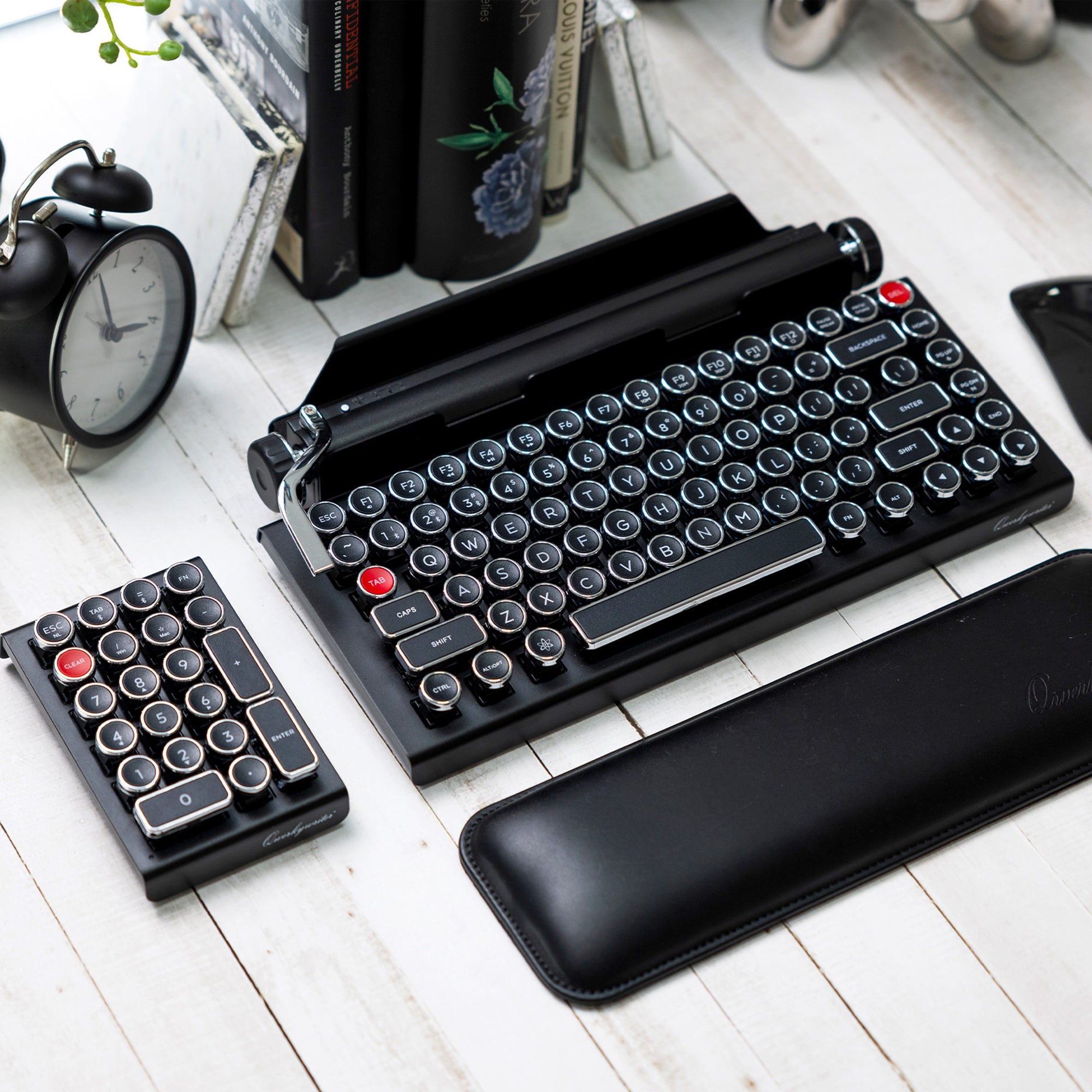 Black typewriter keyboard  for use with an iPad on a white background