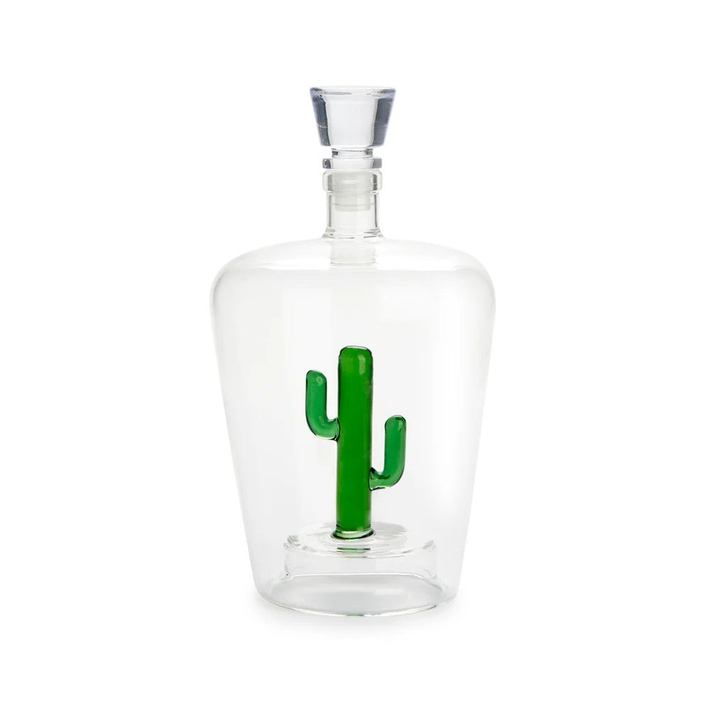 Clear glass decanter with a green cactus design on a white background