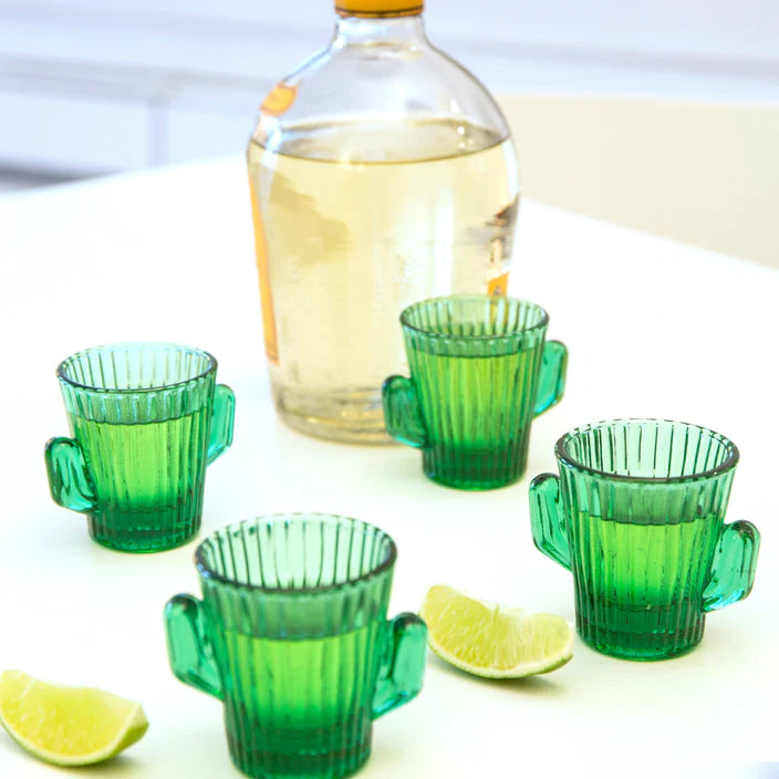 Feeling a little parched at the party? Then reach for these cacti shaped, thirst-quenching shot glasses. Packaged as a set of four to allow you to share the fun with three other friends! Set of four green glass shot glasses. 4 x 1oz glasses.