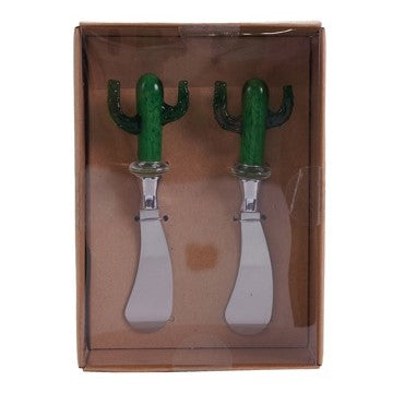 This set of two stainless steel spreading knives have a unique glass cactus-shaped handle is not only stylish but also highly functional. Made from durable stainless steel, this knife is built to last and is easy to clean. Perfect for butter, spreads, jams, jellies and more. Set of two Materials: Stainless steel, glass Hand wash Dimensions each knife: 5" x 1.75"