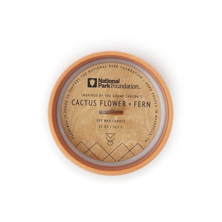 This scent for this unique candle was inspired by the cactus flowers and ferns found at the Grand Canyon, and is designed to bring the essence and feelings of Grand Canyon National Park indoors. Made in partnership with the National Park Foundation. 11 oz. Vessel: Textured ceramic. Size: 4.125" L x 4.125" W x 4.25" H.