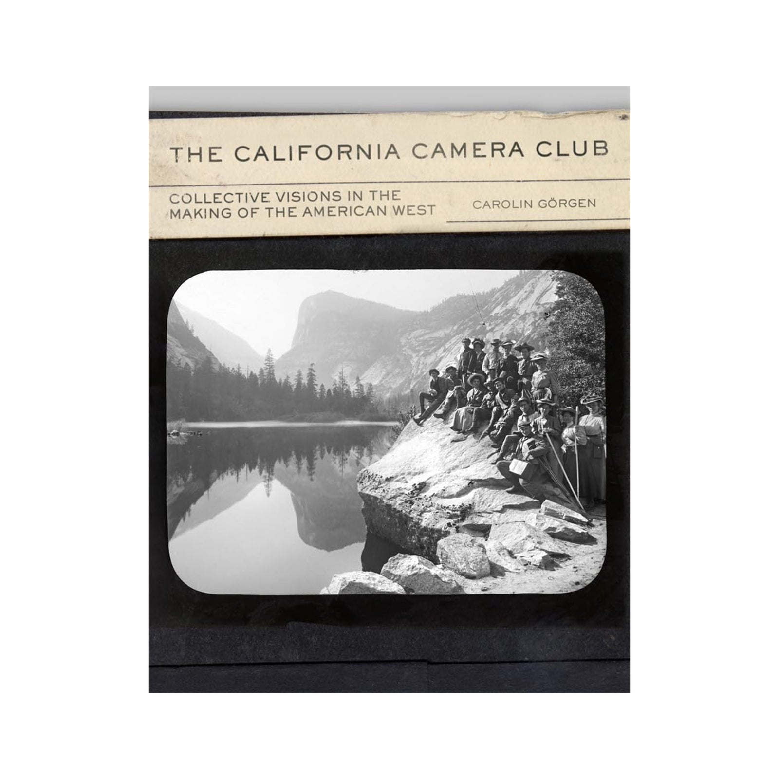 Book cover of 'The California Camera Club' with a black and white photo of a group by a lake.