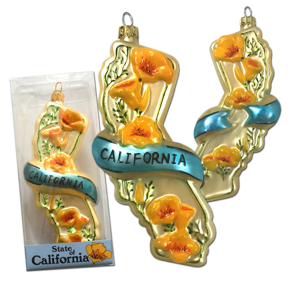Show your love for the golden state with this state-shaped glass ornament. Golden poppies add a burst of color. Designed by local California artist Ethel Martinez. Hand-painted and hand-glittered Blown glass ornament Size: 5.5" x 2" Gift boxed.