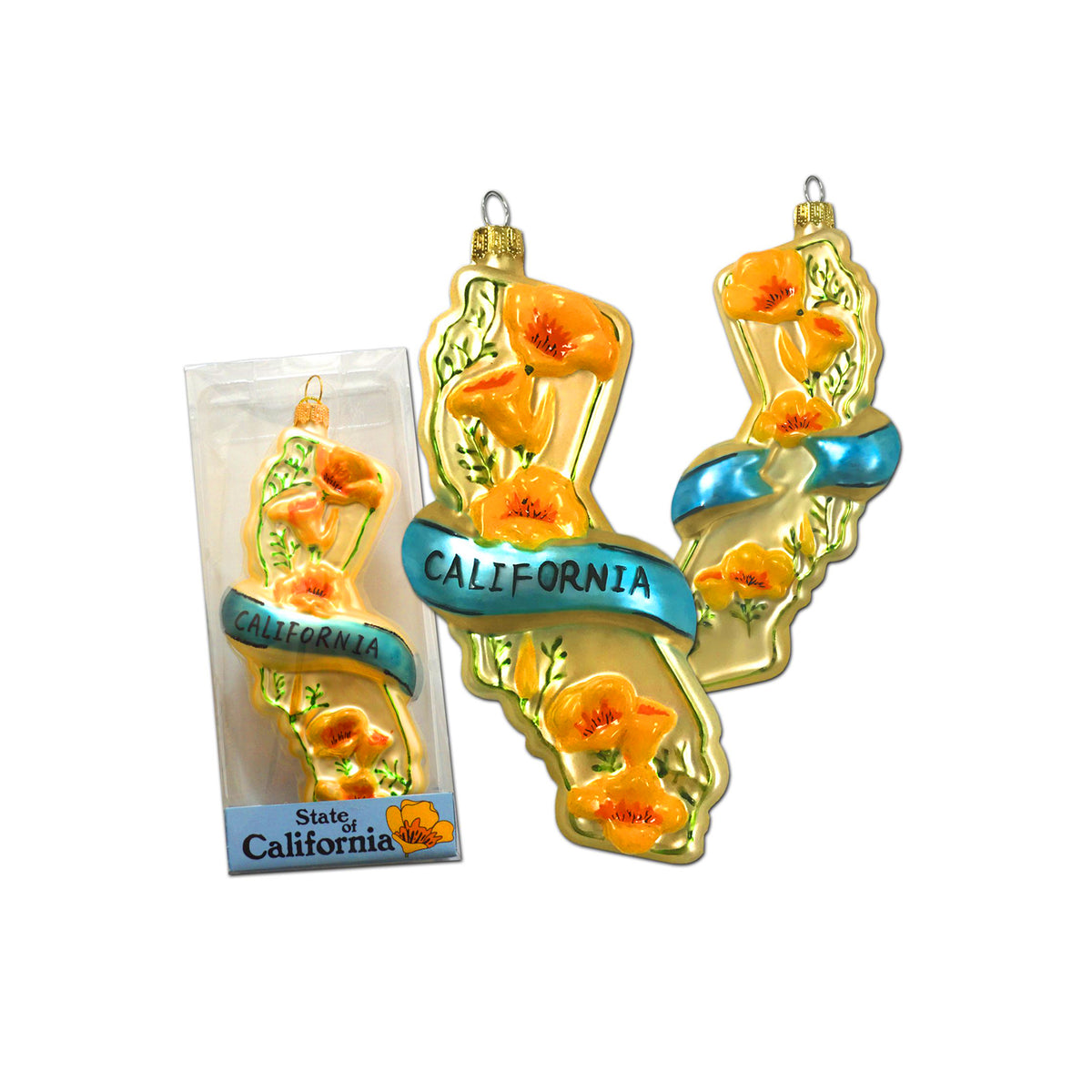 A decorative glass ornament shaped like the state of California, featuring orange poppy flowers and a blue banner reading 'CALIFORNIA,' shown alongside its retail packaging on a white background.
