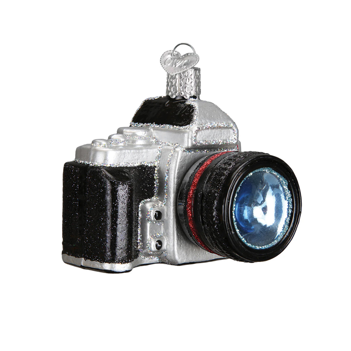 Camera-shaped glass holiday ornament on a white background