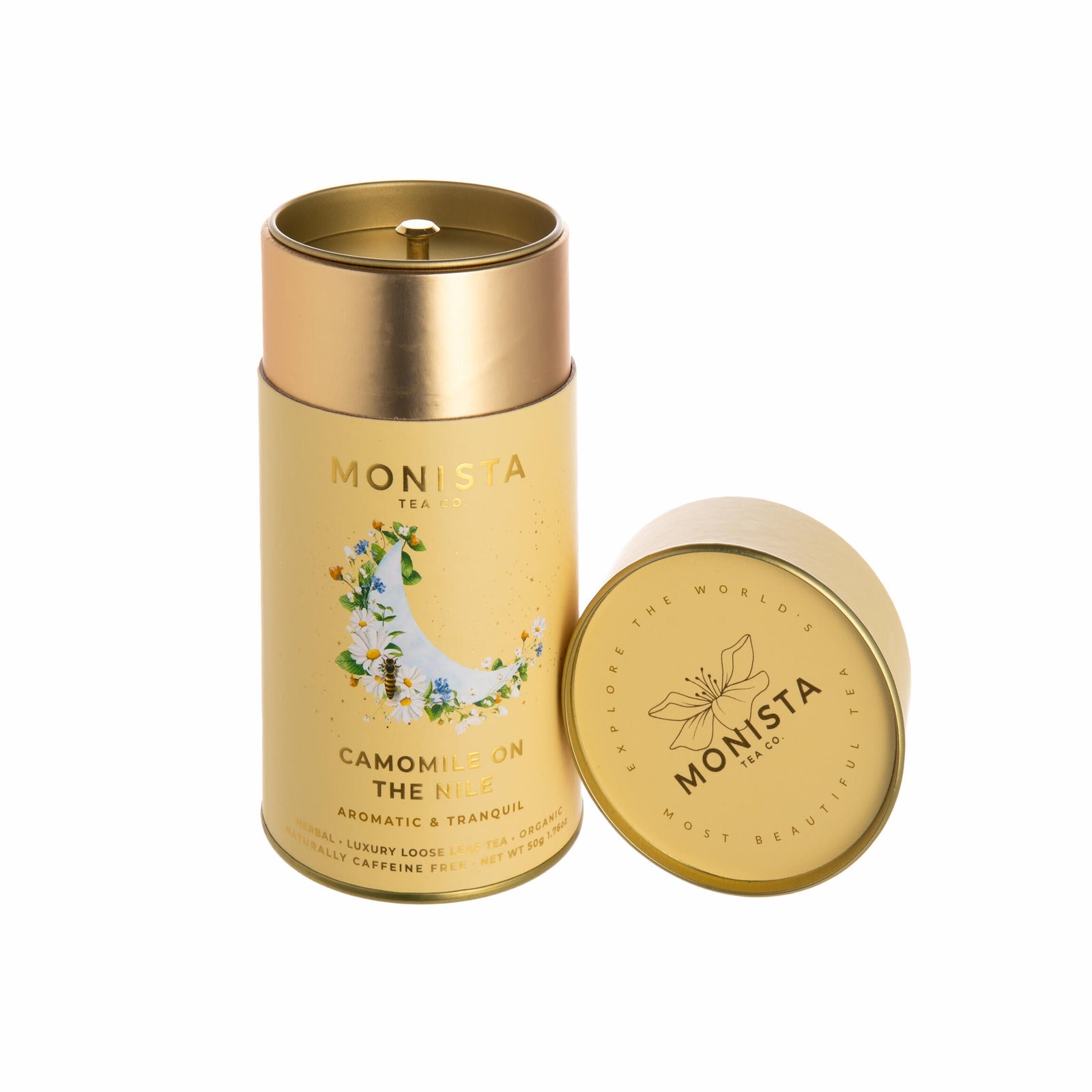 Gold chamomile tea container with 'Monista' branding on a white background