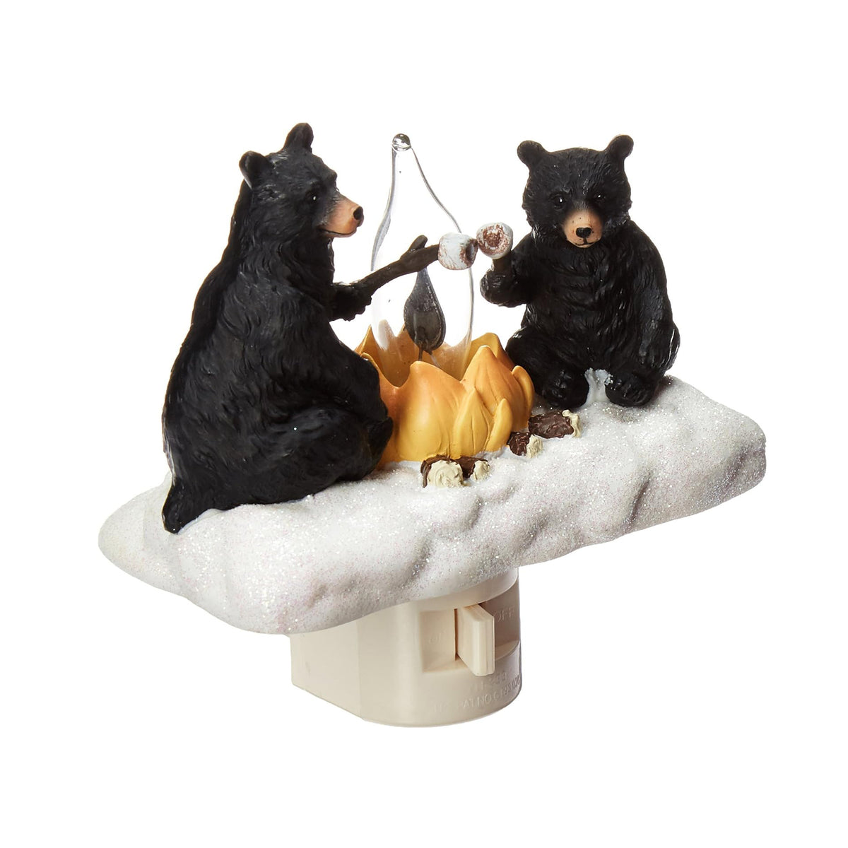 Plug-in night light featuring two bear figurines toasting marshmallows around a campfire on a white background