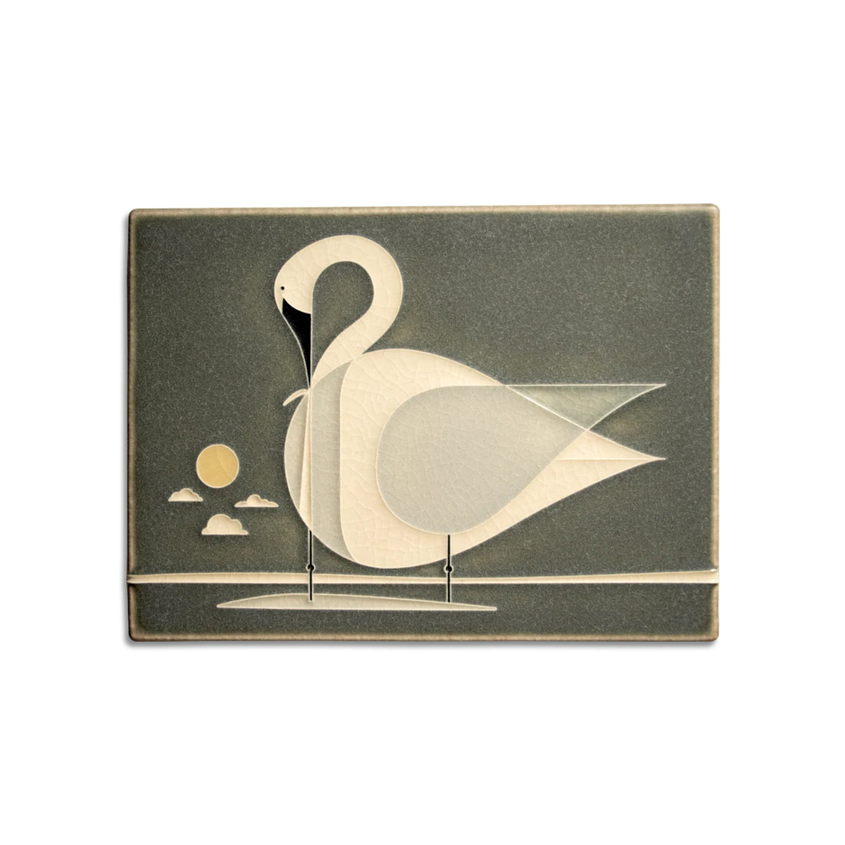 Decorative tile with a stylized swan design on a green background
