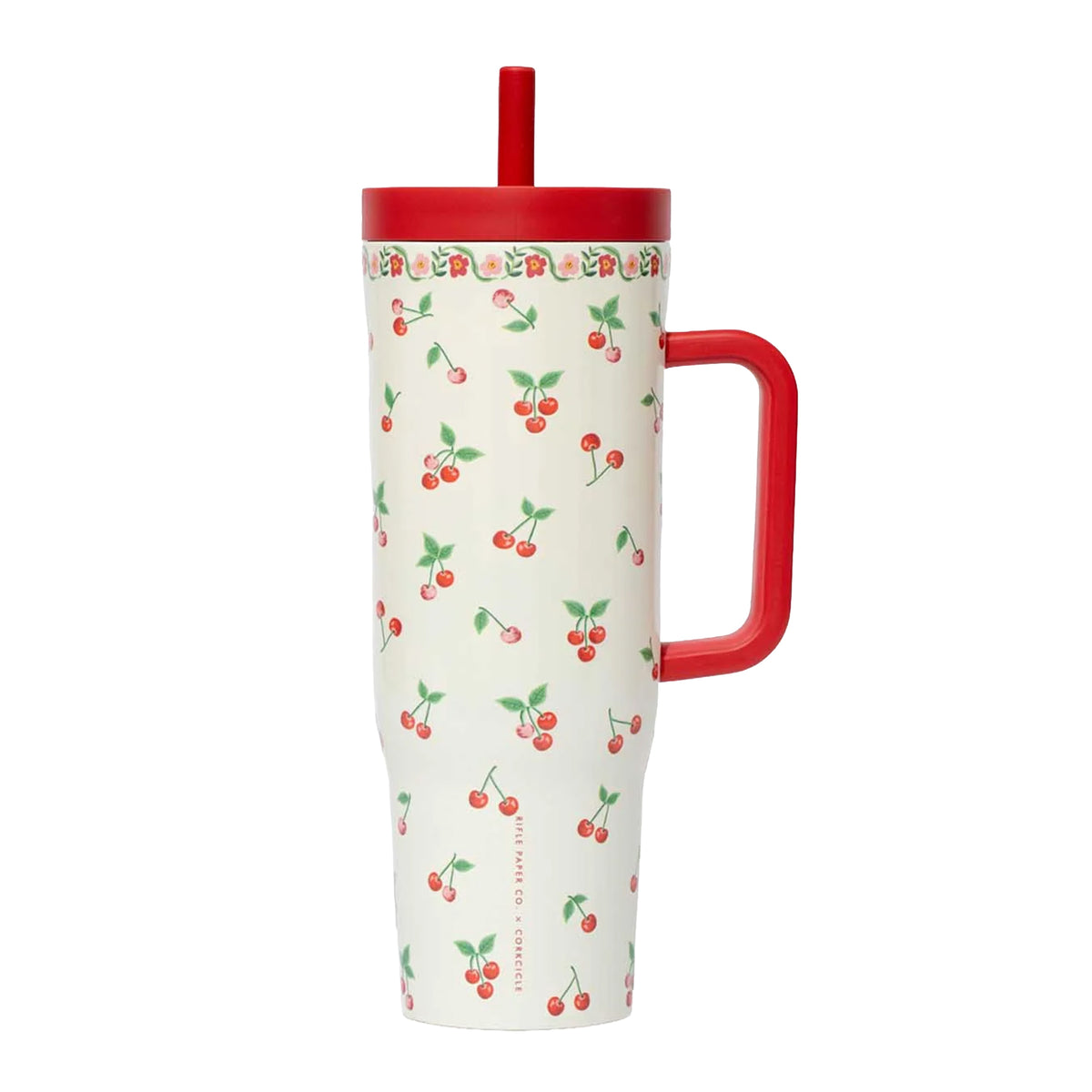 Tumbler with cherry pattern and red lid and handle on a white background