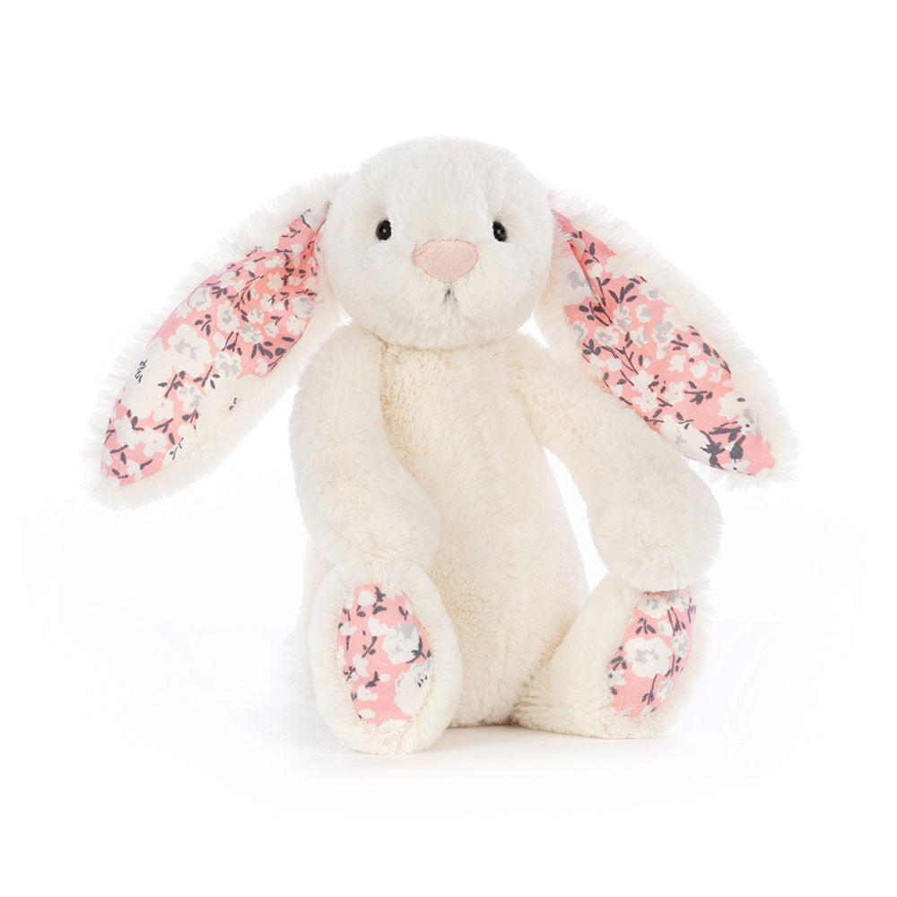 Cherry Blossom Bunny is dressed up for spring with adorable ditsy-print ears and paws! This creamy bunny has a powder-pink nose, cuddly tummy, and silky bobtail. A gorgeous gift for nature lovers. Dimensions: 7.1in x 3.5in x 3.1in Sitting Height: 5in. Suitable from birth.