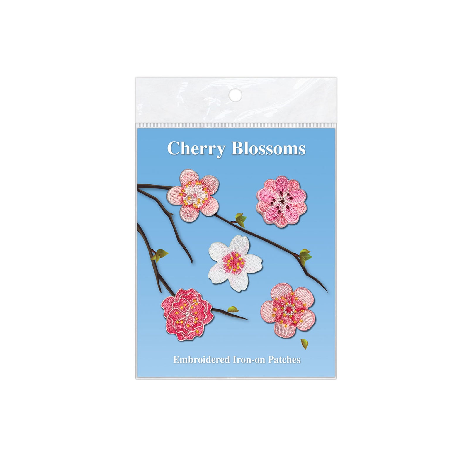 Packaging of cherry blossom embroidered iron-on patches with a blue background