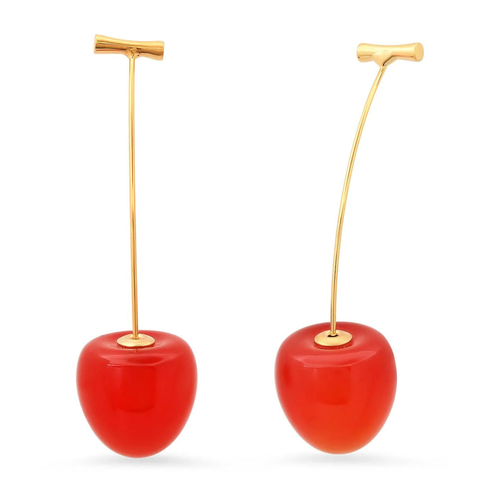 Add a pop of sweetness to your outfit with these cherry drop earrings! Perfect for any occasion, these earrings are the cherry on top of any outfit, (pun intended). Materials: Resin, brass Dimensions: 2" long. 'Cherry' is 0.5" x 0.75".