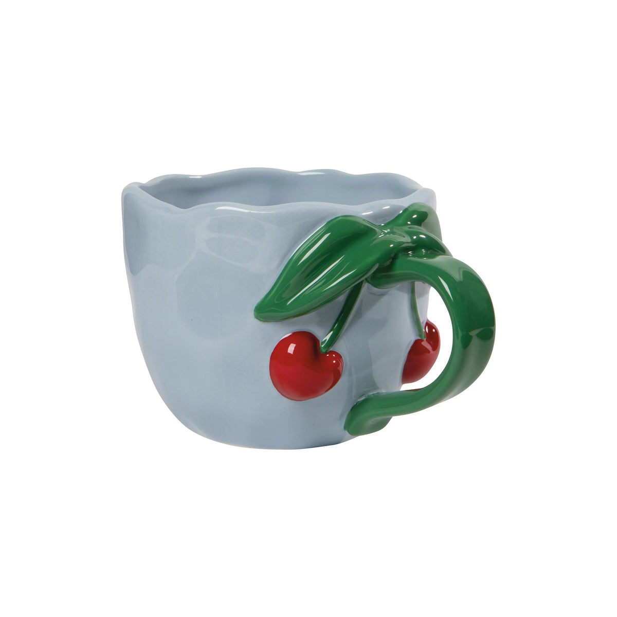 A light blue ceramic cup with a sculpted handle shaped like a green cherry vine with two red cherries, shown on a plain white background.