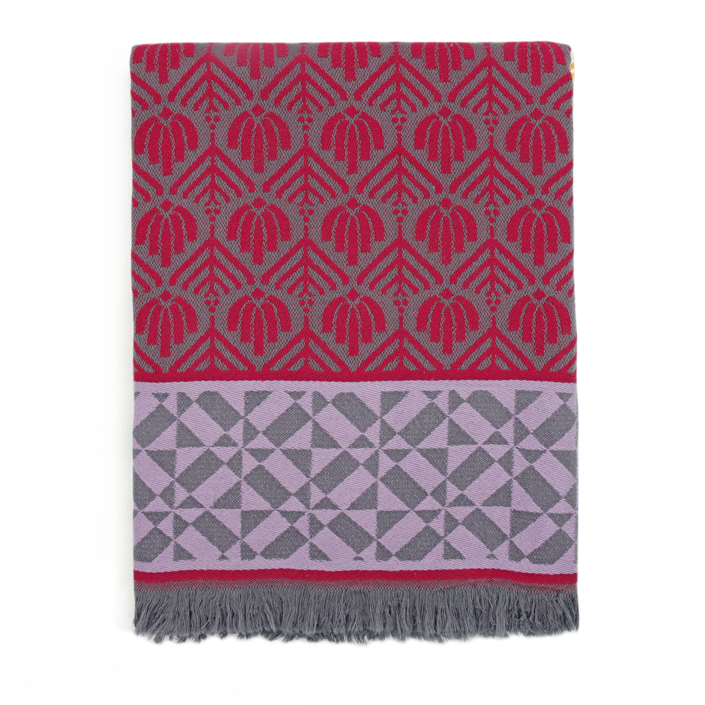 The pyramid motif featured on this pretty and versatile cotton throw blanket is a tribute to the Temple of Kukulcan in Chichen Itza, the pre-Columbian Mayan city in Mexico’s Yucatán Peninsula. A symbol of eternal life in Turkish decorative arts, the Tree of Life also represents togetherness. 57" x 75". 100% cotton.