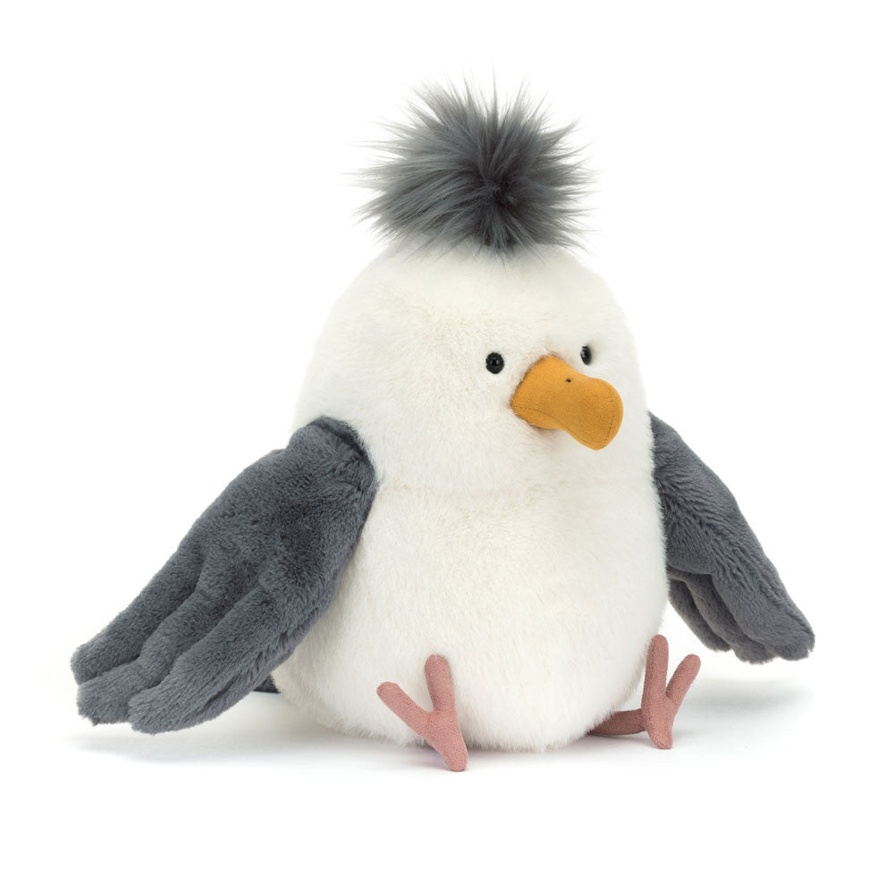 Chip Seagull is a top beach bird. In soft cream fur with dark grey wings, Chip has thin, suedette legs and a dark grey tuft. With a curved mustard suedette beak, Chip is ready for a beach picnic or two this summer! Dimensions: 9.8" x 5.5" x 6.7". Sitting Height: 9" Care Instructions: 86-degree Fahrenheit wash only. Do not tumble dry, dry clean, or iron. Check all labels upon arrival of purchase Safety Recommendations: Not recommended for children under 12 months due to fiber shedding