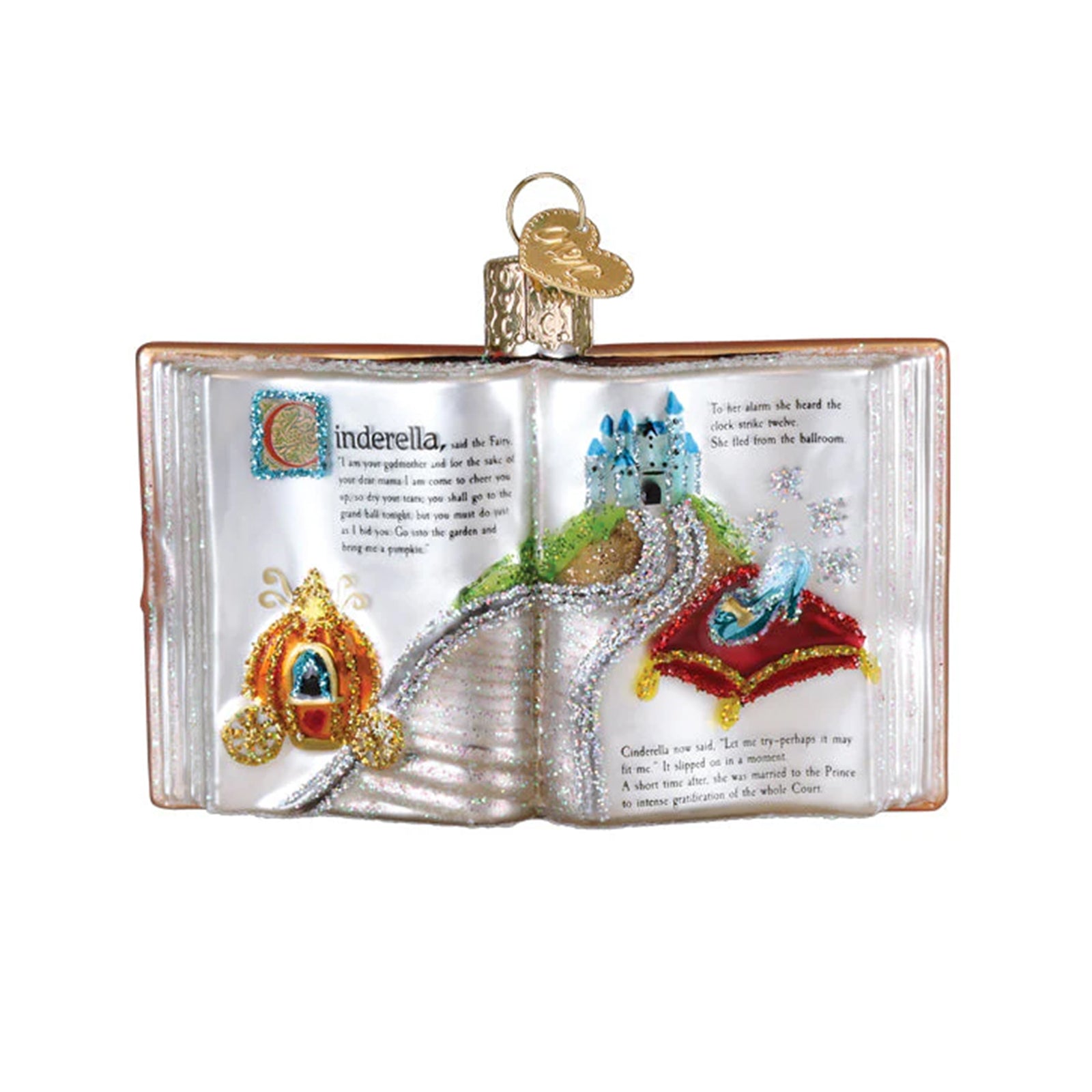 Decorative ornament shaped like an open book with Cinderella's carriage and glass slipper on a white background