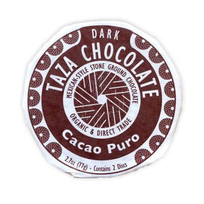 Stone ground, organic Mexican-style dark chocolate discs bursting with bold flavor and texture. These rustic, minimally processed discs let you experience chocolate with true grit! Two delicious chocolate discs in each package, perfect for sharing. 70% 2.7 oz Dark Chocolate Disc. 