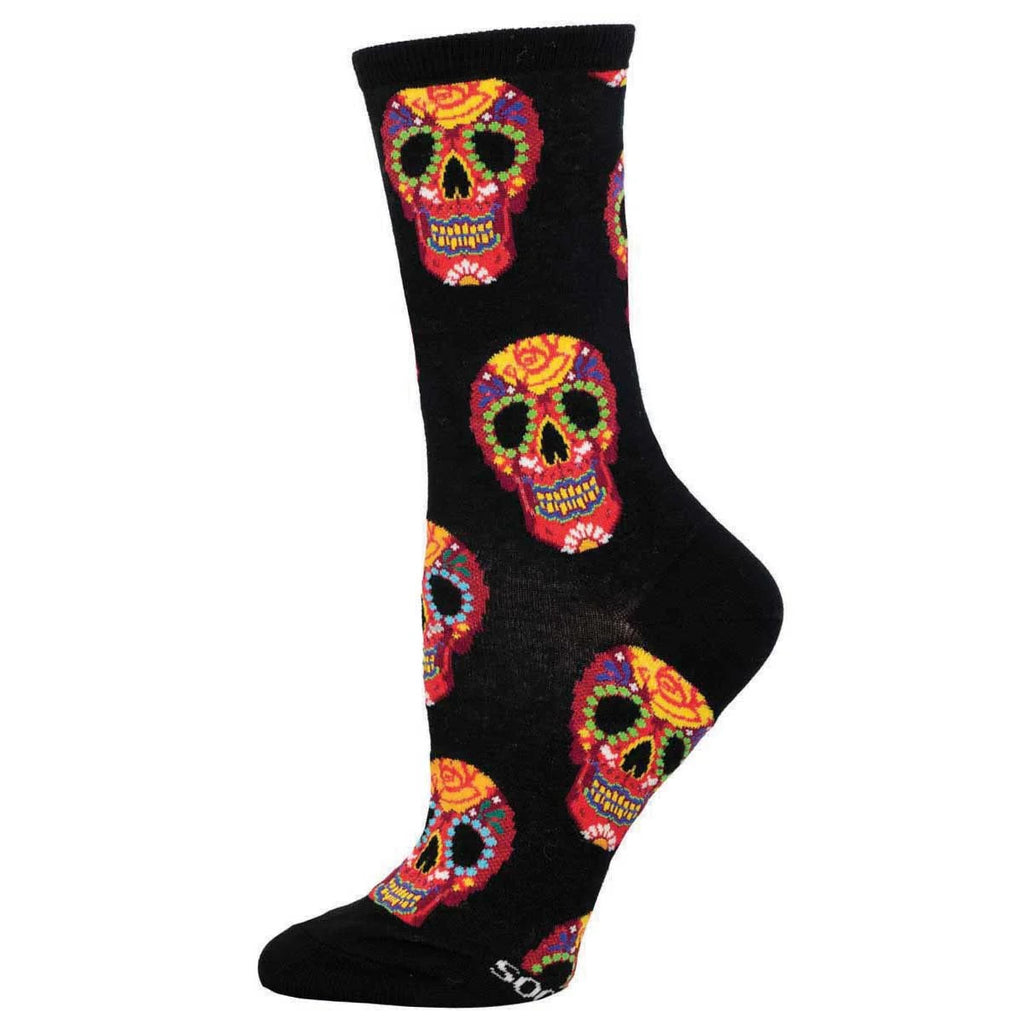 These fun & vibrant socks are an ode to Dia de Los Muertos, a celebration where loved ones are honored with colorful altars, lively music, and delicious offerings. Materials: 42% Cotton, 56% Nylon, 2% Spandex Size: S/M 9-11 (Women's Shoe Size 6-10.5 and Men's Shoe Size 5-9).