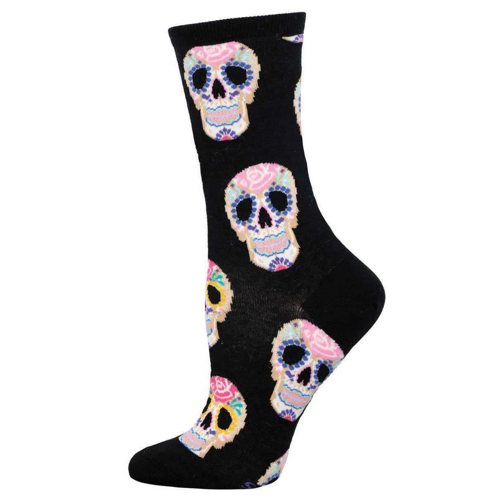 These fun & vibrant socks are an ode to Dia de Los Muertos, a celebration where loved ones are honored. It's a time to remember that even in death, the spirit of those we cherish lives on in our hearts and traditions. 42% Cotton, 56% Nylon, 2% Spandex Size: Women's Shoe Size 6-10.5, Men's Shoe Size 5-9.