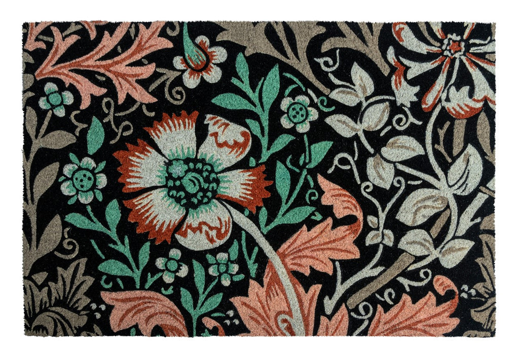 The carnation surrounded by leaves featured on this mat is inspired by an Arts and Crafts wallpaper, designed by William Morris. This delightful doormat is designed and crafted to be stylish and functional. Material: 100% natural coir with PVC backing. Dimensions: 24" x 36". 1/2" thick.