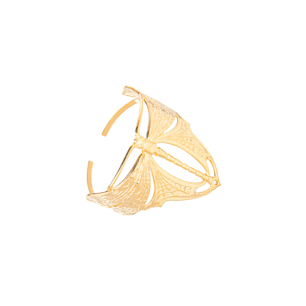 This striking golden cuff bracelet features an Art Nouveau style flying dragonfly.  This carefully crafted bracelet is made from high quality stainless steel and is gilded with real gold. Materials: Dimensions: Cuff circumference 6". can expand to 7". Cuff length: 2.25" Made in Paris, France.