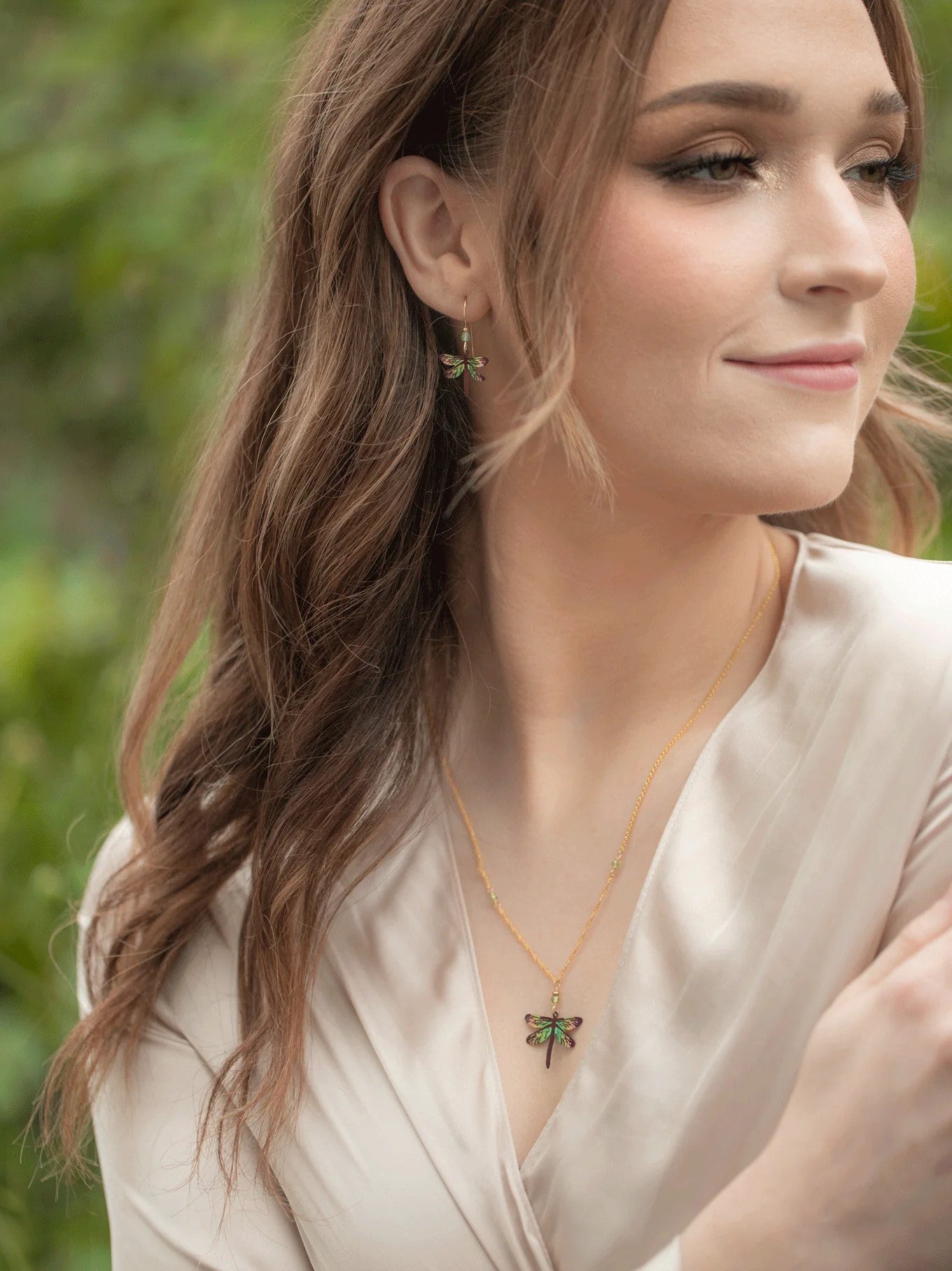 These colorful dragonfly earrings are artfully crafted with the most exquisite detailing: vibrant color, state-of-the-art metalwork, and careful hand linking and wiring. True-to-life renderings of these fascinating creatures are sure to create a buzz! Materials: Niobium, gold fill ear wires Dimensions: 1 1/4" × 3/4".