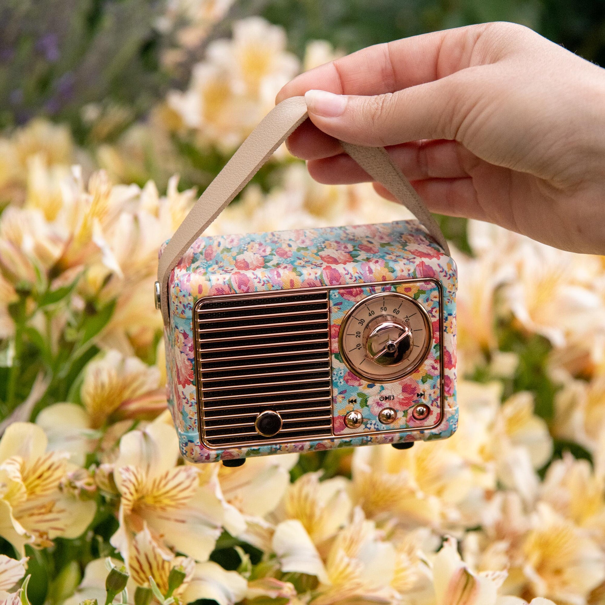 This beautiful, vintage-style floral-print speaker would make a unique and stylish gift for any music lover. Easily portable, rechargeable, and wireless, this speaker can go wherever you go. Bluetooth speaker Comes with USB charging cable and 3.5 mm audio cable. Dimensions: 3" x 2.5" x 2".