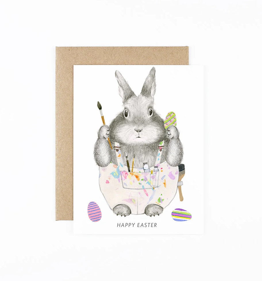 Hancock the bunny has been getting creative, painting eggs for Easter, and getting a little messy in the process! Celebrate the season with this cute bunny notecard. Size: A2 ¼” x 5 ½” Printed on soft white paper and paired with a kraft envelope. Blank interior for personal message. Made in the USA.